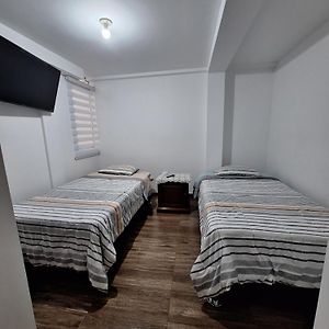 Zimmer mit zwei Einzelbetten